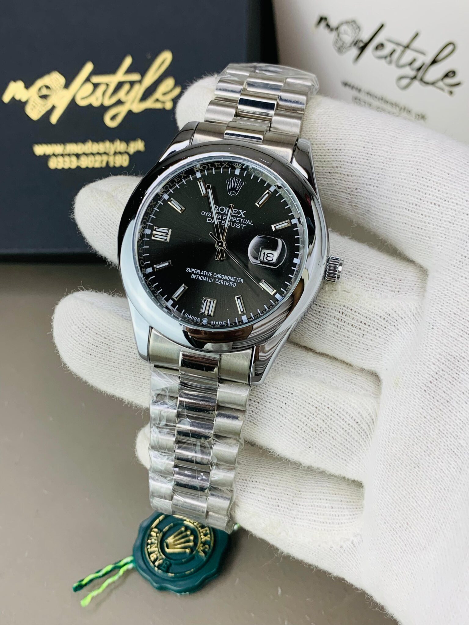 Silver with black dail